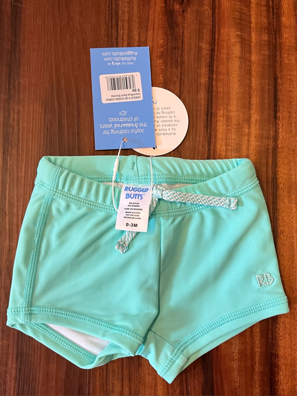 NWT RuggedButts Island Blue Swim Shorties 0-3m